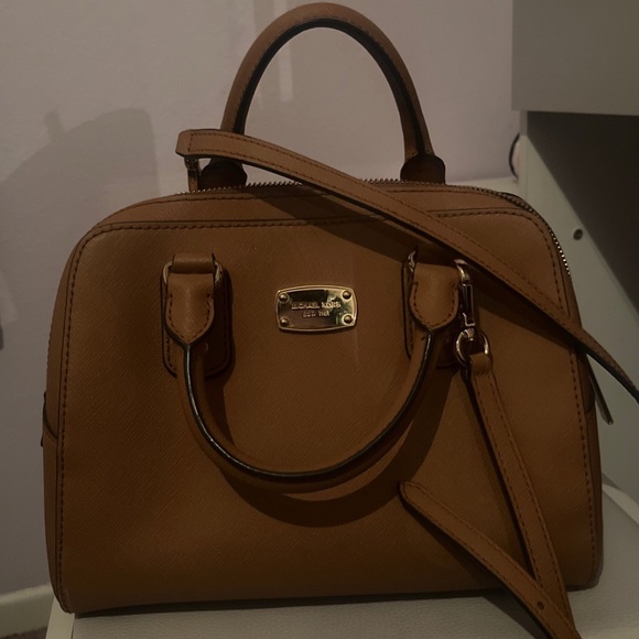 Brown Michael Kors bag. Normal sized bag. Fits a lot of stuff in it - Picture 3 of 6